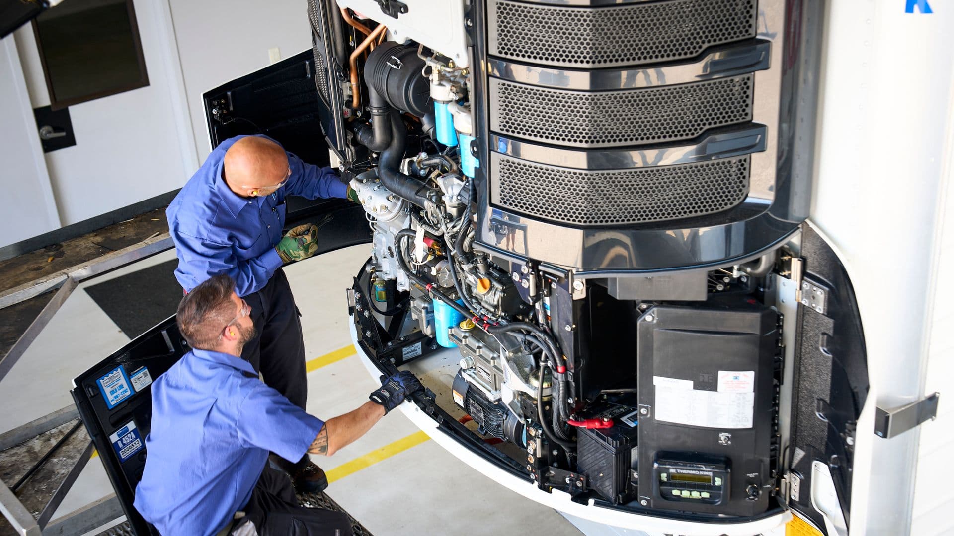 Certified technician performing preventive maintenance