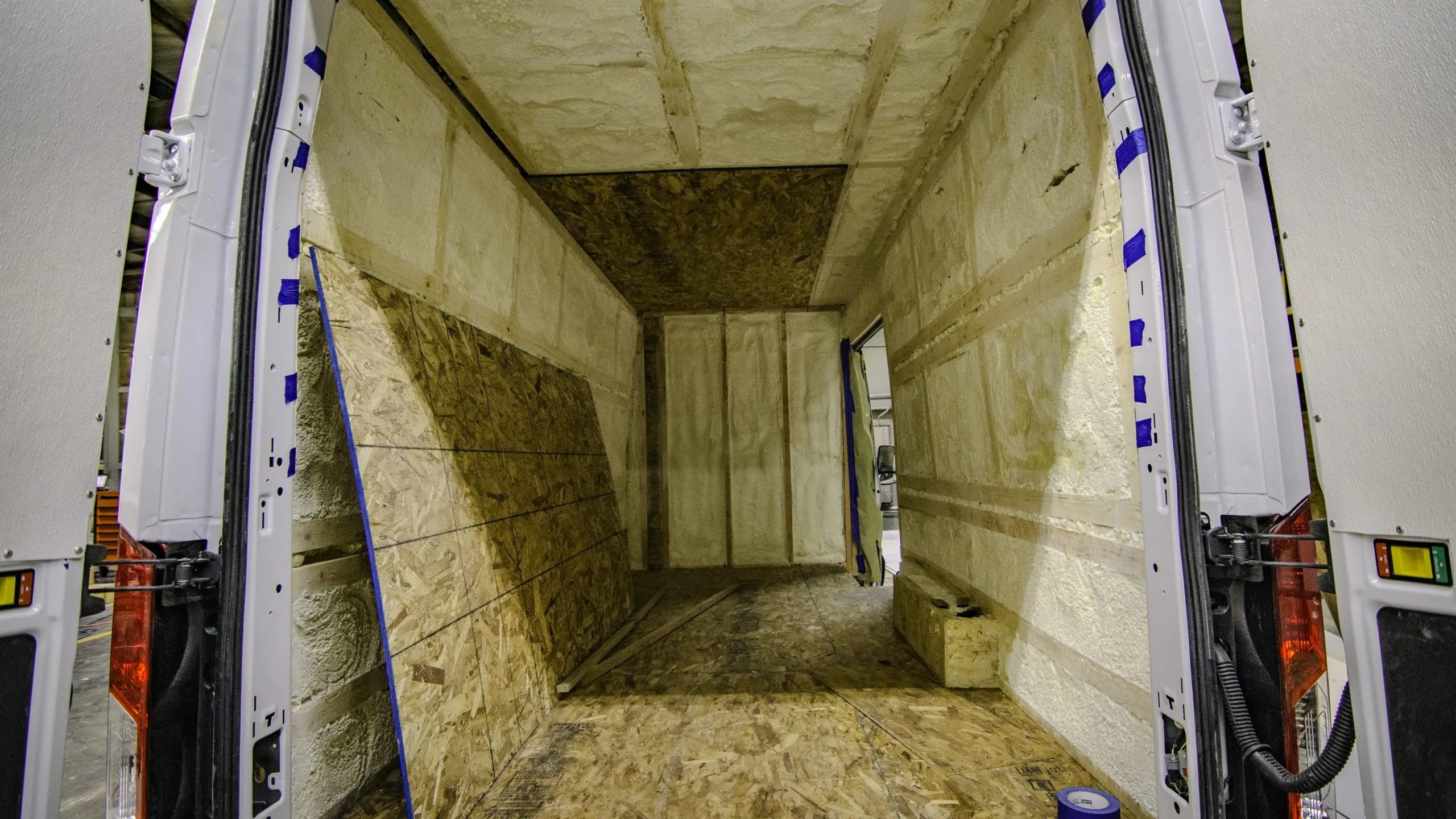 Refrigerated van interior — insulated walls and diamond plate floor